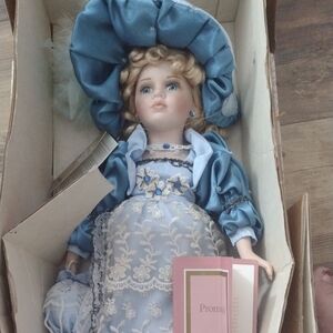Porcelain Doll with Blue Dress and Hat